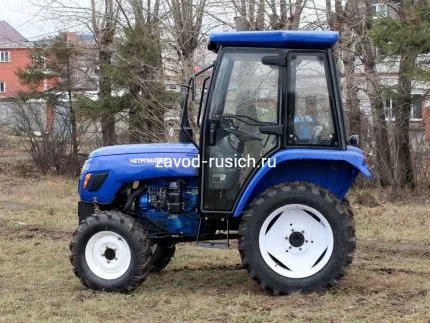 Трактор Четрпиллер XT-404 с кабиной